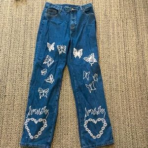 From shein medium high waisted, long, loose, non stretch butterfly paints